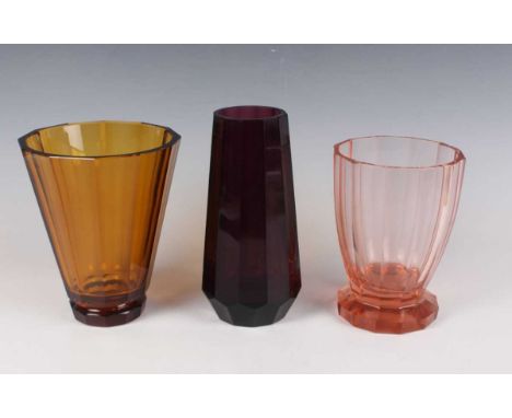 An Art Deco amethyst tinted glass vase, in the style of Josef Hoffmann for Moser, 1920s, of tapered faceted form, unmarked, h