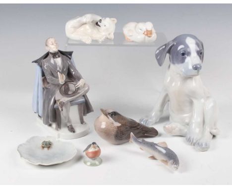 A Royal Copenhagen model of a Pointer Puppy, No. 051, designed by Erik Nielsen, 1990s, together with a small group of other R