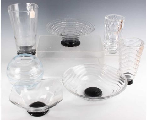 An Orrefors wave cut flared circular bowl, designed by Simon Gate, raised on a small black foot, engraved marks to base with 