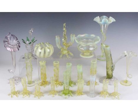 A group of John Walsh Walsh mostly straw opalescent uranium glass rustic thorn posy vases, late 19th century, of trunk form o