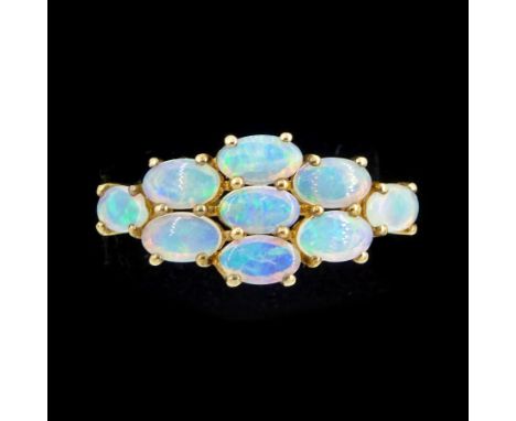9ct gold nine stone oval cut opal ring, hallmarkedCondition Report:Approx 1.8gm, size N-O, max depth = 9.2mm