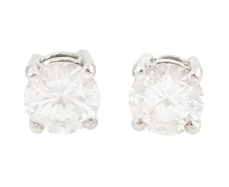 Pair of 18ct gold round brilliant cut diamond stud earrings, hallmarked, total diamond weight approx 0.65 caratCondition Repo