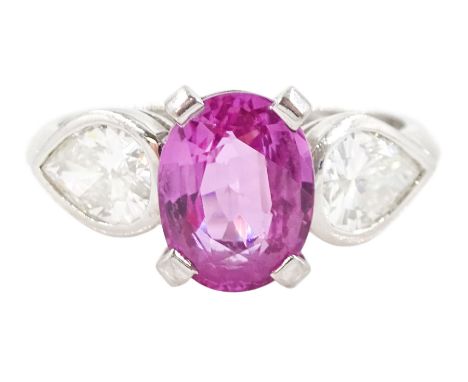 Platinum three stone oval cut pink sapphire and pear cut diamond ring, London 1999, sapphire approx 2.20 carat, total diamond
