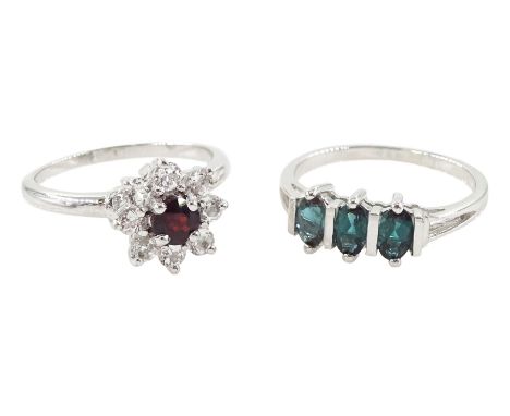 White gold garnet and white topaz cluster ring and a white gold three stone tourmaline ring, both hallmarked 9ctCondition Rep