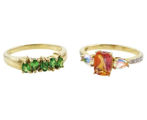 Gold five stone pear cut tsavorite garnet ring and a gold topaz ring, with diamond set shoulders, hallmarked 9ctCondition Rep