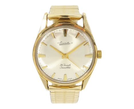 Everite gentleman's 9ct gold manual wind wristwatch, silvered dial with dagger hour markers, hallmarked, on gilt expanding st