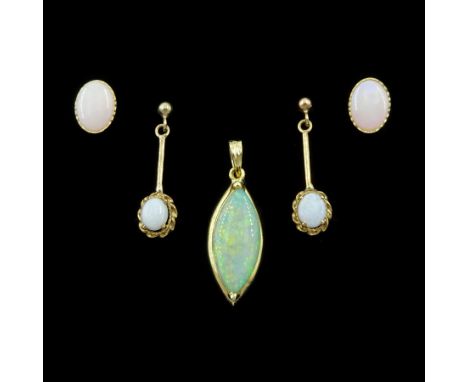 14ct gold marquise cut opal pendant and two pairs of 9ct gold opal stud earringsCondition Report:14ct approx 1.1gm, length = 