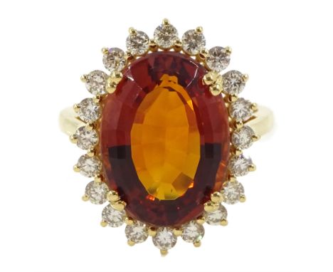 18ct gold oval cut citrine and round brilliant cut diamond cluster ring, stamped, citrine approx 7.35 carat, total diamond we