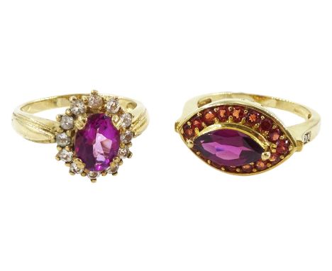 Gold marquise cut and round cut garnet ring, with diamond chip shoulders and a gold pink and white topaz cluster ring, both h