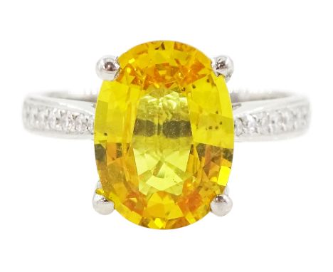 Platinum single stone oval cut yellow sapphire ring, with diamond set shoulders, hallmarked,  sapphire approx 3.40 caratCondi