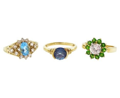 Three 9ct gold blue and white topaz cluster ring, diopside and white zircon cluster ring and a single stone topaz ring, all h
