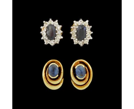 Pair of gold sapphire and diamond stud earrings and a pair of single stone sapphire stud earrings, both 9ctCondition Report:A