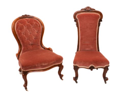A Victorian carved walnut button-back lady's chair, the spoon back with foiiate cresting and short foliate carved arms, raise