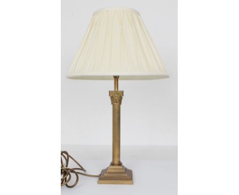 Three table lamps - modern, comprising a silvered-metal style square baluster lamp with pale gold shade, 65cm. high; together