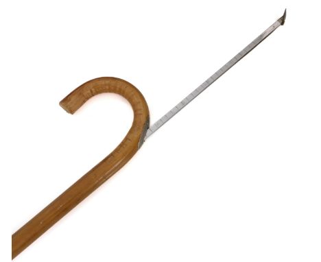 A bamboo horse measuring stick (hands and centimetres) and with spirit level to the cross-bar