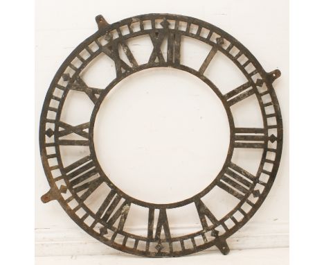 A large antique cast iron turret clock dial - early to mid-20th century, with skeletonised Roman numeral chapter ring, 90cm. 