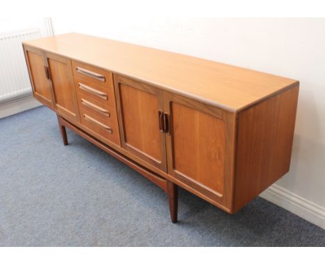 A G-Plan Fresco teak sideboard - 1970s, with a central bank of four graduated drawers, the top drawer fitted for cutlery and 