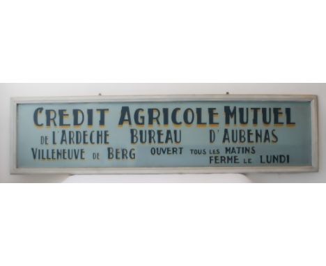 A large French vintage-style &lsquo;Credit Agricole Mutuel&rsquo; painted wooden sign, late 20th century (241 x 61 cm).