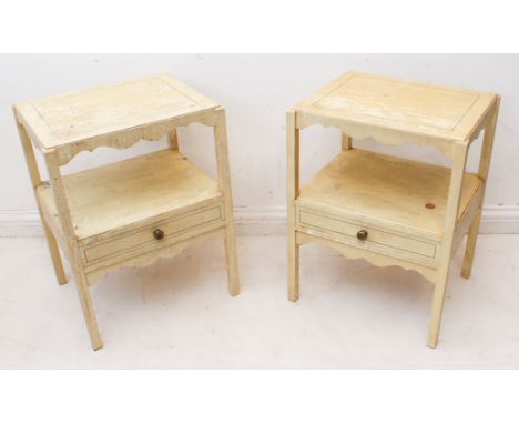 A pair of French early 19th century style painted two tier bedside tables: late 20th century, painted in cream crackle glaze 