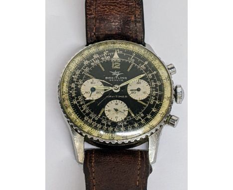 A Breitling Navitimer chronograph manual wind, gents stainless steel wristwatch, circa 1960s, having a black dial with centre