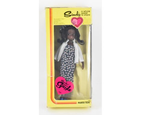 A vintage Sindy's friend Gayle doll by Marx Toys, circa 1978, in original box with posing stand, the doll wearing a floral pr