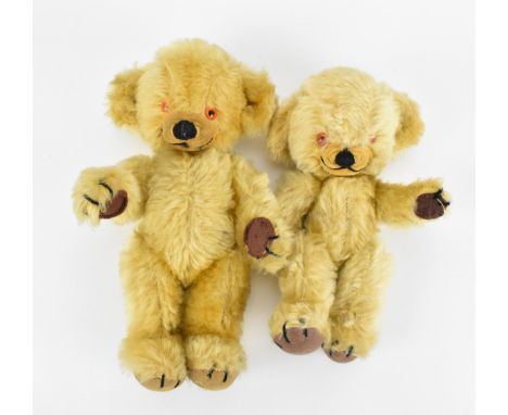 Two 1950s Merrythought 'Cheeky' teddy bears, in light mohair, jointed, with stitched nose, hands and feet,  orange plastic ey