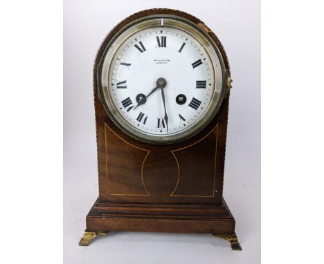 An Edwardian mahogany and string inlaid mantle clock, the white enamel dial having Roman numerals and inscribed 'Mappin &amp;