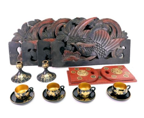 A set of four Asian lacquered panels, 20th century, each carved and pierced with a pheasant, 48cm wide, also a Chinese red la