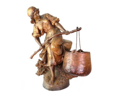 A Goldscheider gilded and bronzed patinated terracotta figure, circa 1900, after a model by Perigot, of a young woman holding