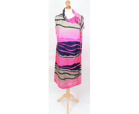 A pink taupe day dress with tie detail at neck, by Cresta Couture.