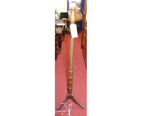 A contemporary turned and fluted standard lamp (height excluding fittings) 145.5cm