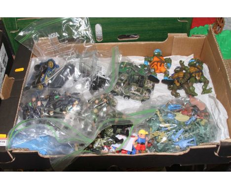 A quantity of cartoon and action man related figures