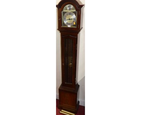 A reproduction mahogany grandmother clock, having an arched brass and silvered Tempus Fugit dial, with two weights and pendul