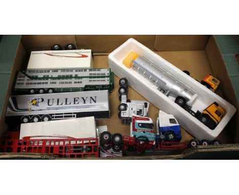 A tray of loose haulage models, to include Corgi Pollock Scania, Corgi Mercedes Actros and others 