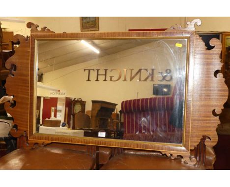 A mahogany fret-cut rectangular wall mirror in the Chippendale taste, 103 x 62.5cm 