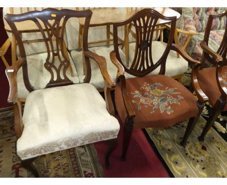 Two similar Chippendale style mahogany elbow chairs, each with floral upholstered stuff over seats, together with a pair of m
