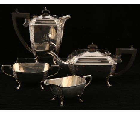 George V four piece tea and coffee service with foliate engraved corners, supported on pad feet, by Joseph Gloster Ltd, Birmi