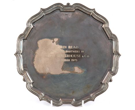 A presentation silver salver with wavey border, by Mappin & Webb, Sheffield 1974, 20.8ozt 648gm