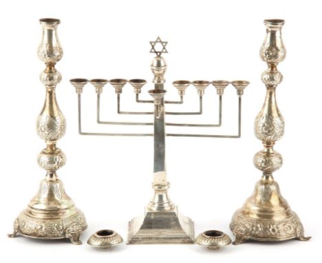 Nine light Menorah with star of David on square tapering column and weighted platform base, probably by A Taite & Sons Ltd, L