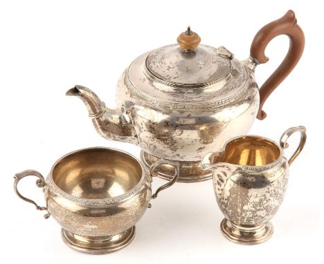 Three piece tea service of globular form, by Adie Brothers Ltd, Birmingham 1925, gross weight 29ozt 909gm