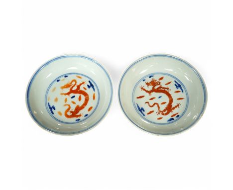 A pair of Chinese porcelain ‘dragon’ saucer dishes, Yongzheng mark but Republic period, 16cm in diameter. Condition - good On