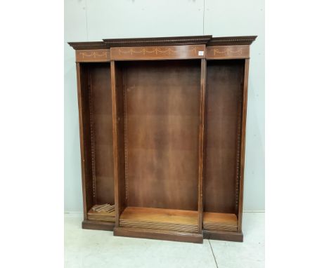 A reproduction mahogany breakfront open bookcase, width 163cm, depth 34cm, height 179cm. Condition - fair, lacking some shelf