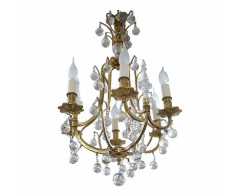 A large brass hanging chandelier. Condition - good, not tested