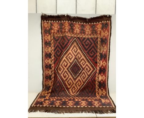 A Kilim flatweave carpet, approximately 320 x 210cm. Condition - fair