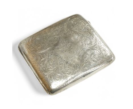 An engraved white metal cigarette case, engraved with a monogram and with a faux tortoiseshell lined interior, 88mm. Conditio