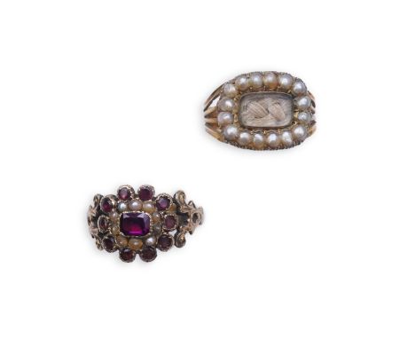 A George III seed pearl mourning ring and a garnet and seed pearl ring, mid 19th century, the seed pearl mourning ring centri