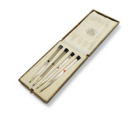 A cased set of four engine turned white metal (stamped 925) and enamel propelling bridge pencils, each stem enamelled with th