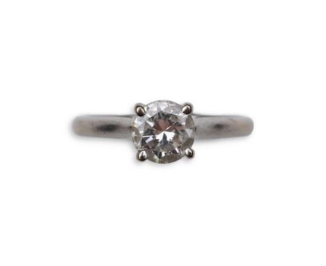 A solitaire diamond ring, claw-set with a brilliant-cut diamond weighing approximately 0.65 carats, mounted in 18ct white gol