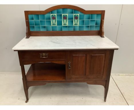 An Art Nouveau marble topped tile backed washstand, width 114cm, depth 51cm, height 118cm. Condition - good