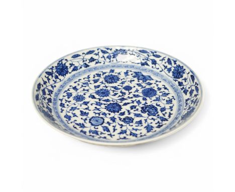 A blue and white Ming style shallow bowl, Qianlong mark but later, 18cm in diameter. Condition - good No damage seen.